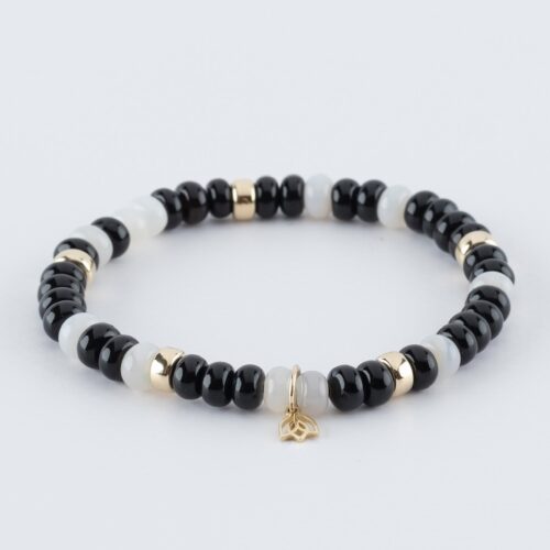 Y&G Black & White Edelstenen armband (6x4mm kralen) | Vijf 14kt gouden beads & tulp logo Onyx | Agaat