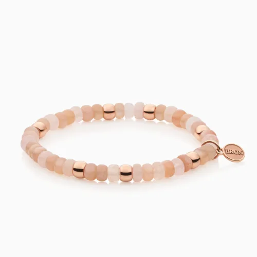 bron-reflex-armband-3, Deze edelstenen armbanden met 7 gouden ornamentjes en Bron label. Maansteen en roze beryl 8AR3985MIX01