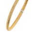 Geelgouden flex armband met witgouden bead